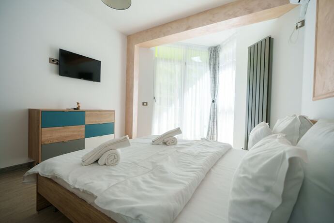 Imagen de la habitación del Hotel PROMENADA Alezzi Apartments. Foto 12
