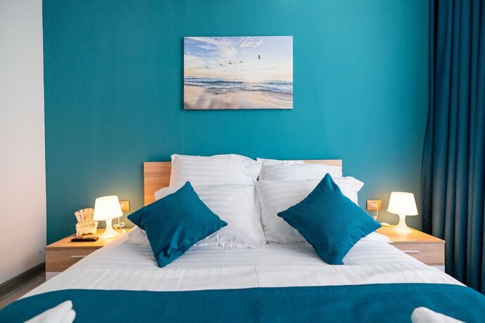Imagen de la habitación del Hotel PROMENADA Alezzi Apartments. Foto 15