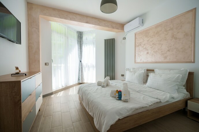 Imagen de la habitación del Hotel PROMENADA Alezzi Apartments. Foto 16