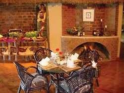 Imagen del bar/restaurante del Hotel PROTEA HOTEL AISHI MACHAME. Foto 2