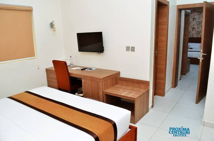 Imagen de la habitación del Hotel PROXIMA CENTAURI HOTEL. Foto 17