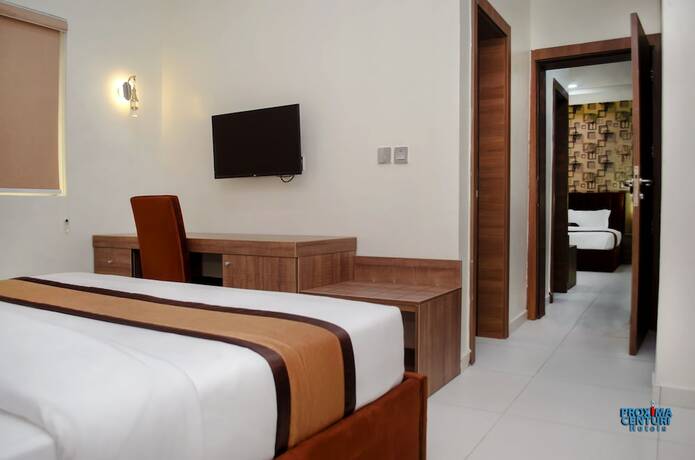 Imagen de la habitación del Hotel PROXIMA CENTAURI HOTEL. Foto 18