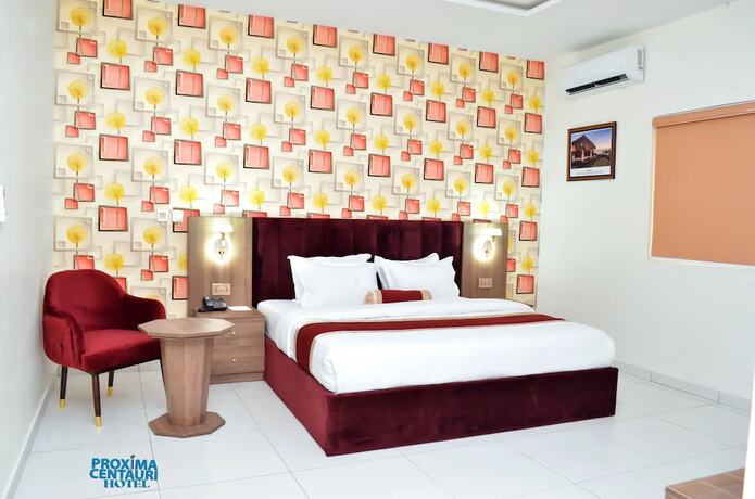 Imagen de la habitación del Hotel PROXIMA CENTAURI HOTEL. Foto 20