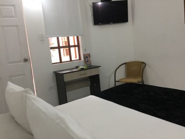 Imagen de la habitación del Hotel PSH Pasajero Suites Centro Internacional. Foto 4
