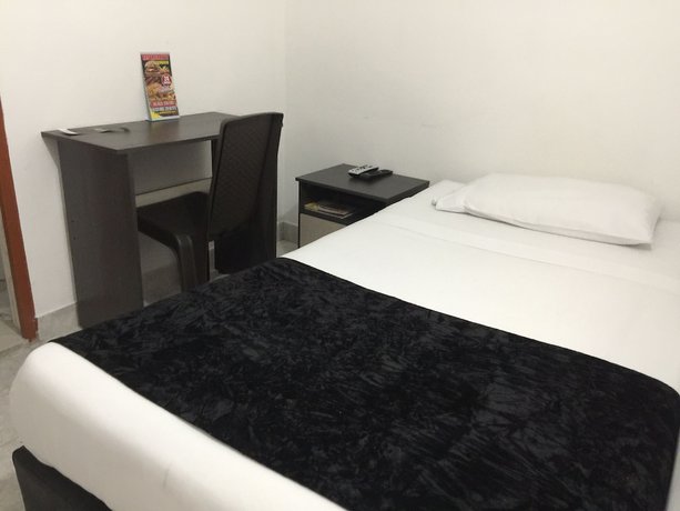 Imagen de la habitación del Hotel PSH Pasajero Suites Centro Internacional. Foto 5