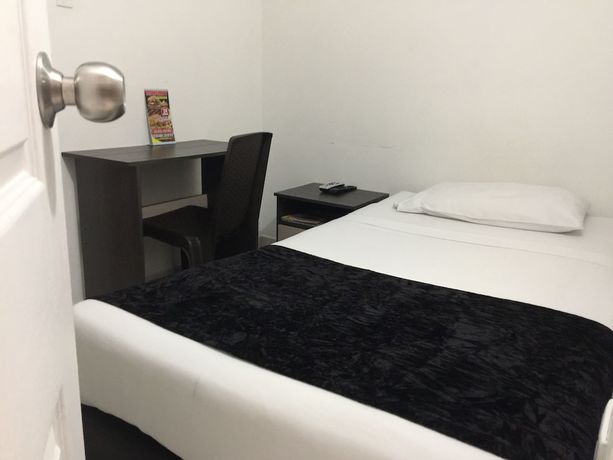Imagen de la habitación del Hotel PSH Pasajero Suites Centro Internacional. Foto 7