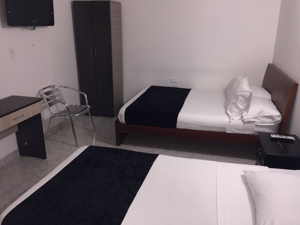 Imagen de la habitación del Hotel PSH Pasajero Suites Centro Internacional. Foto 9