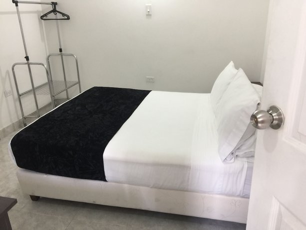 Imagen de la habitación del Hotel PSH Pasajero Suites Centro Internacional. Foto 10