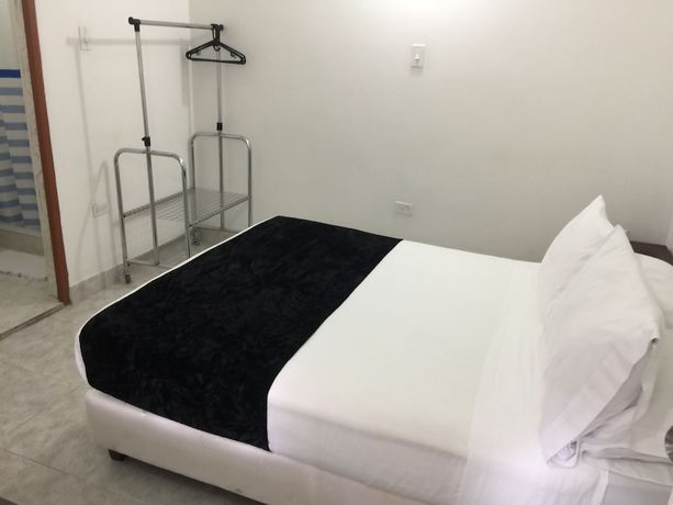 Imagen de la habitación del Hotel PSH Pasajero Suites Centro Internacional. Foto 11