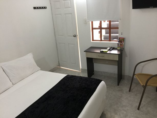 Imagen de la habitación del Hotel PSH Pasajero Suites Centro Internacional. Foto 12