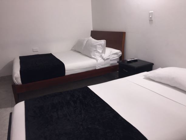 Imagen de la habitación del Hotel PSH Pasajero Suites Centro Internacional. Foto 13