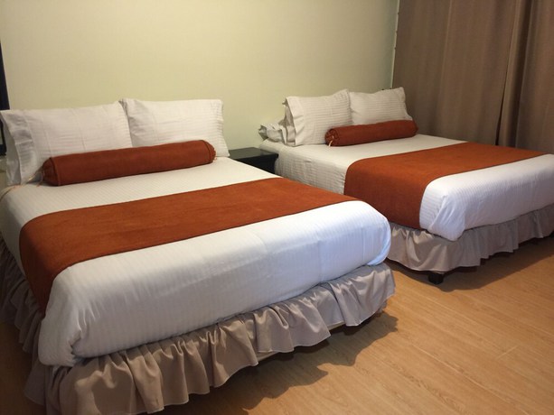 Imagen de la habitación del Hotel PSH Pasajero Suites Corferias. Foto 4