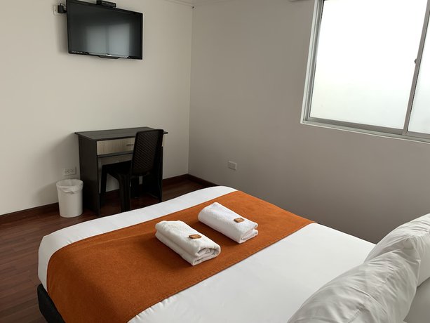 Imagen de la habitación del Hotel PSH Pasajero Suites Corferias. Foto 7