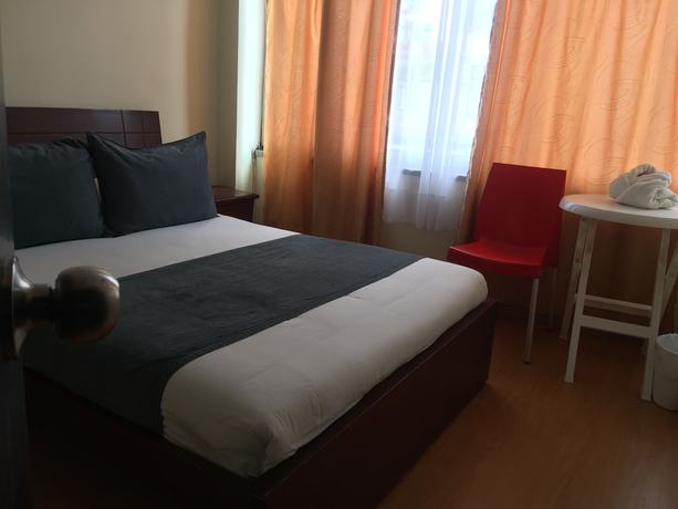 Imagen de la habitación del Hotel PSH Pasajero Suites Corferias. Foto 10
