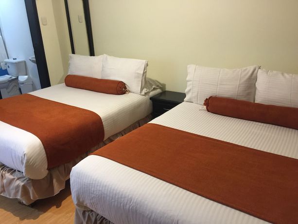 Imagen de la habitación del Hotel PSH Pasajero Suites Corferias. Foto 11