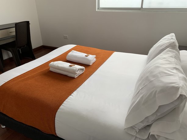 Imagen de la habitación del Hotel PSH Pasajero Suites Corferias. Foto 13