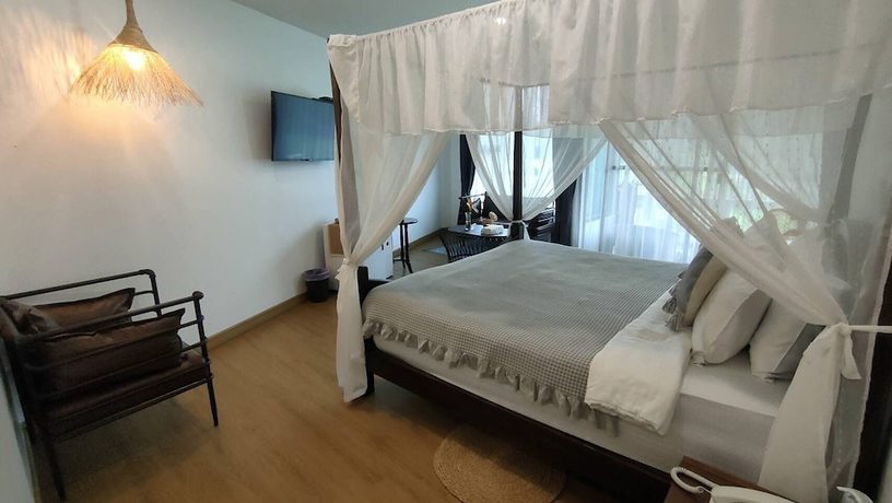 Imagen de la habitación del Hotel PU PAH KANNA PUA. Foto 19