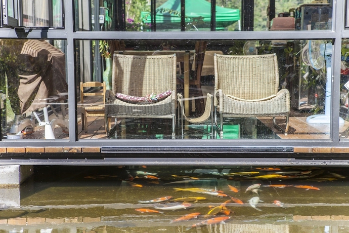 Imagen de los interiores del Hotel PULI GuanPu Fallsview Stay House. Foto 13
