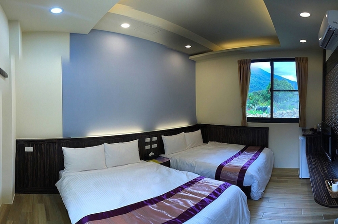 Imagen de la habitación del Hotel PULI GuanPu Fallsview Stay House. Foto 12