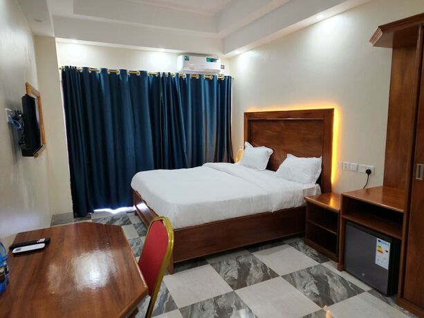 Imagen de la habitación del Hotel PULICKAL HEIGHTS HOTEL. Foto 17