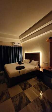Imagen de la habitación del Hotel PULICKAL HEIGHTS HOTEL. Foto 19