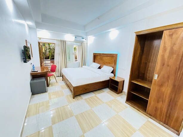 Imagen de la habitación del Hotel PULICKAL HEIGHTS HOTEL. Foto 20