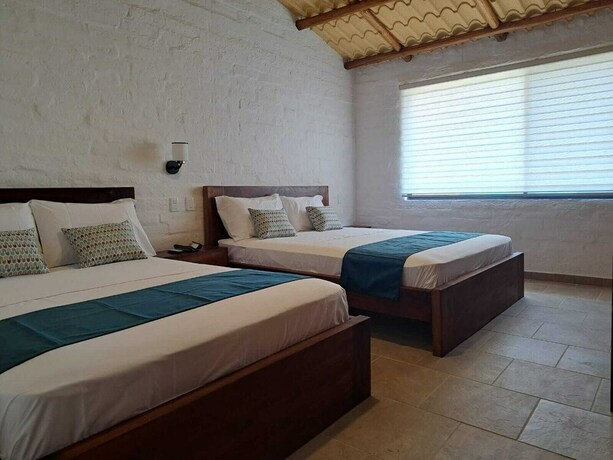 Imagen de la habitación del Hotel PUNTA COCO VILLAS BEACH. Foto 20