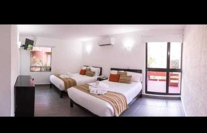 Imagen de la habitación del Hotel PUNTA GALERIA. Foto 17