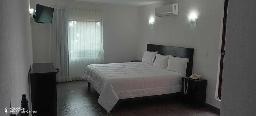 Imagen de la habitación del Hotel PUNTA GALERIA. Foto 18