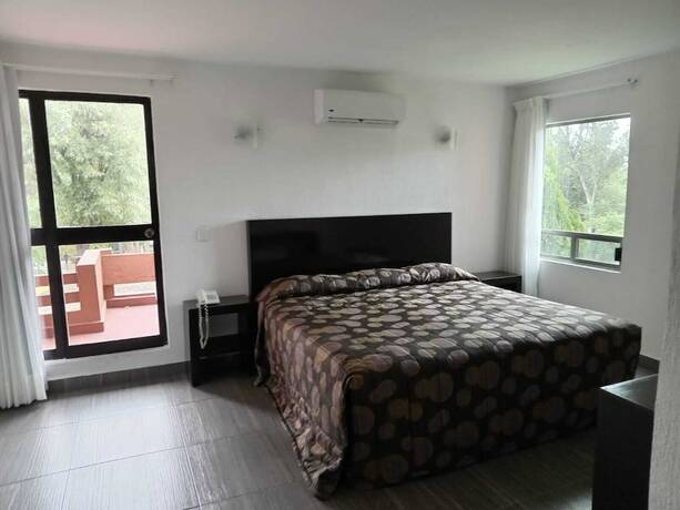 Imagen de la habitación del Hotel PUNTA GALERIA. Foto 19