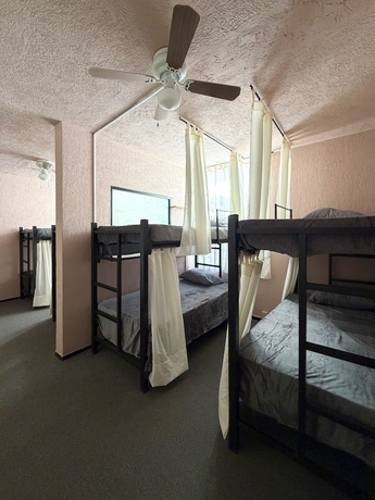 Imagen de la habitación del Hotel PUNTO AMERICANA HOSTAL. Foto 4