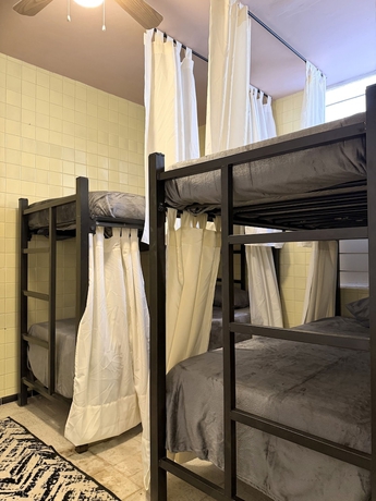 Imagen de la habitación del Hotel PUNTO AMERICANA HOSTAL. Foto 5