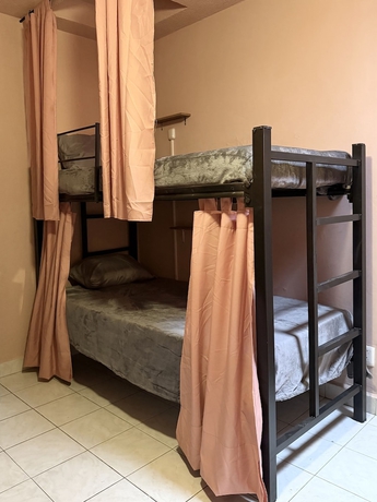 Imagen de la habitación del Hotel PUNTO AMERICANA HOSTAL. Foto 8