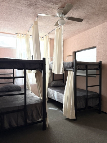 Imagen de la habitación del Hotel PUNTO AMERICANA HOSTAL. Foto 10
