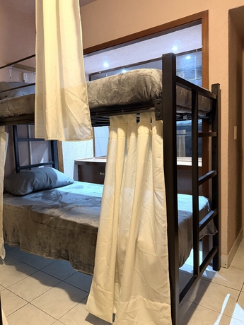 Imagen de la habitación del Hotel PUNTO AMERICANA HOSTAL. Foto 11