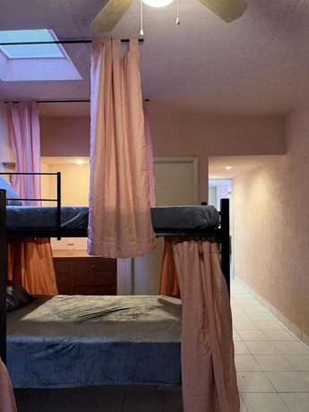 Imagen de la habitación del Hotel PUNTO AMERICANA HOSTAL. Foto 12