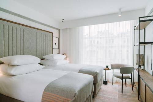 Imagen de la habitación del Hotel PURO Warszawa Centrum. Foto 17