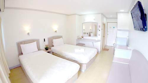 Imagen de la habitación del Hotel P.a. Place. Foto 6