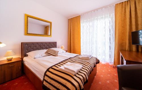 Imagen de la habitación del Hotel Pałacyk. Foto 6