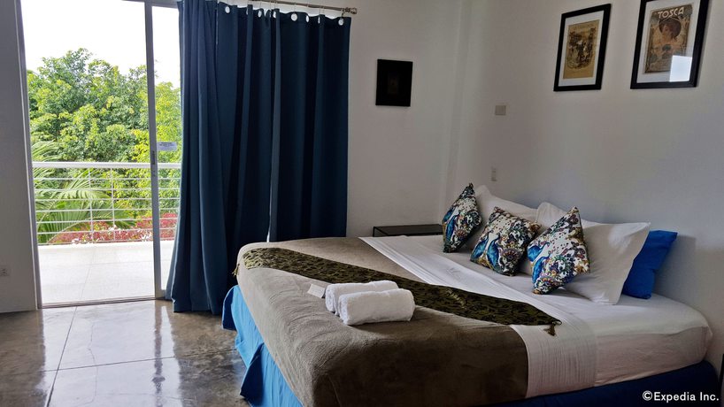 Imagen de la habitación del Hotel Paboreal Boutique Hotel. Foto 14