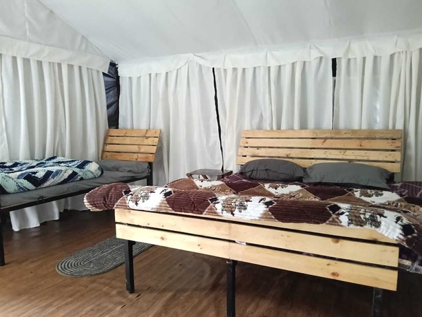 Imagen de la habitación del Hotel Pacific Camp Chopta. Foto 8