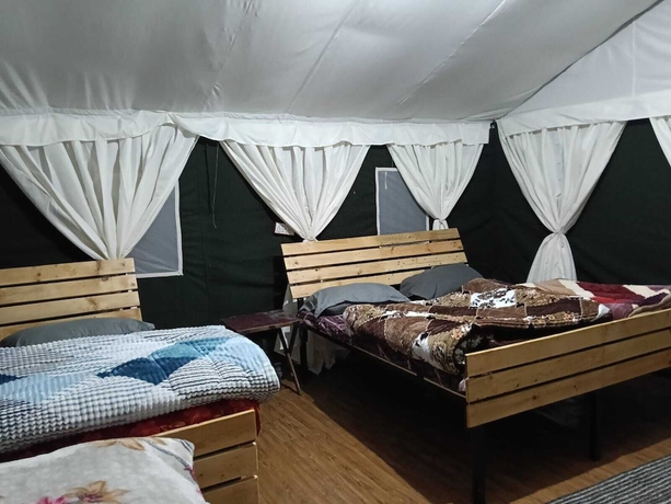 Imagen de la habitación del Hotel Pacific Camp Chopta. Foto 9