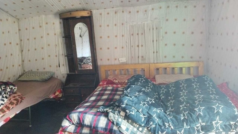 Imagen de la habitación del Hotel Pacific Camp Chopta. Foto 10