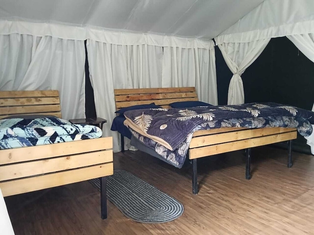 Imagen de la habitación del Hotel Pacific Camp Chopta. Foto 11