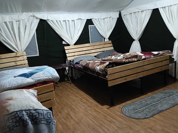 Imagen de la habitación del Hotel Pacific Camp Chopta. Foto 12