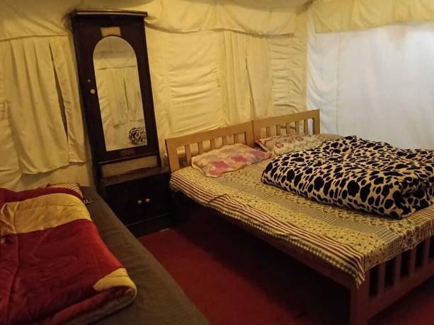 Imagen de la habitación del Hotel Pacific Camp Chopta. Foto 13