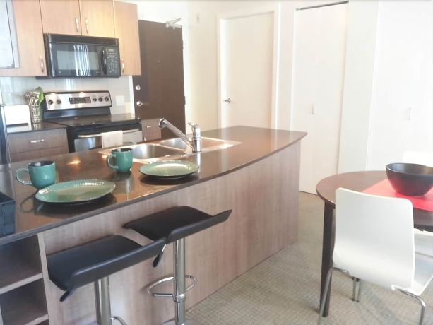 Imagen de la habitación del Hotel Pacific Centre Suites. Foto 6