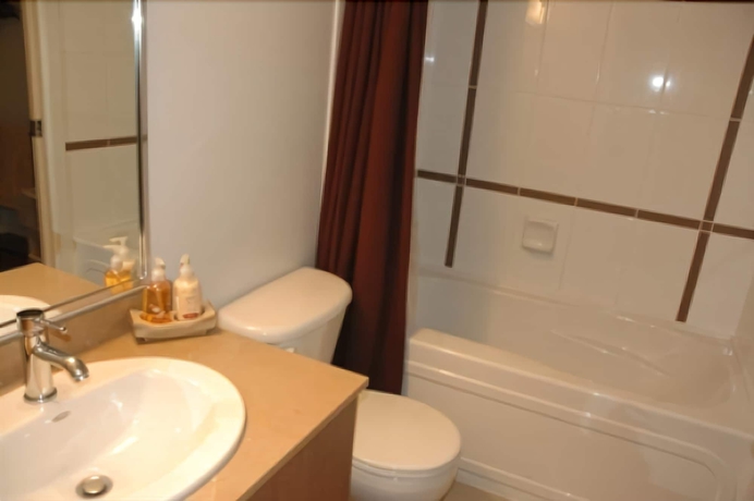 Imagen de la habitación del Hotel Pacific Centre Suites. Foto 18