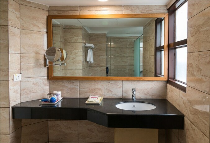 Imagen de la habitación del Hotel Pacific Dehradun. Foto 25