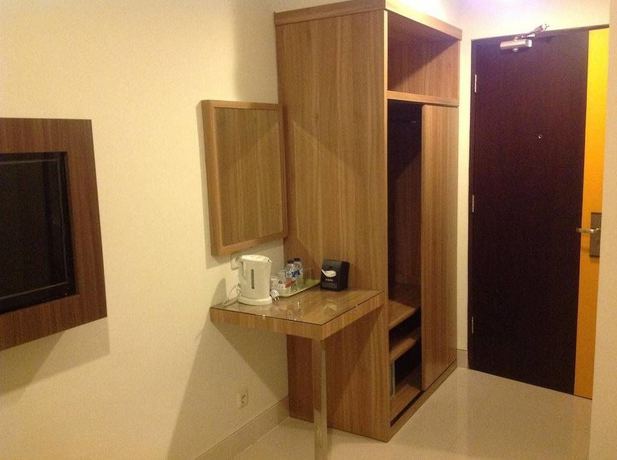 Imagen de la habitación del Hotel Pacific Makassar. Foto 7